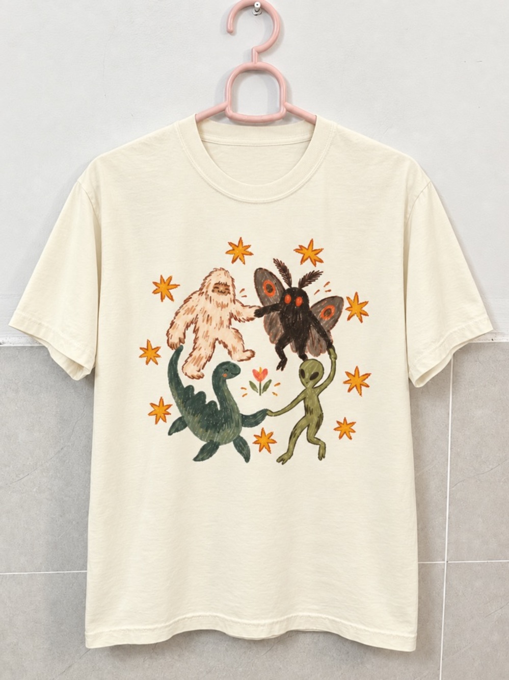 Dancing Cryptids Bigfoot Mothman Alien and Lockness Monster OffWhite T-Shirt